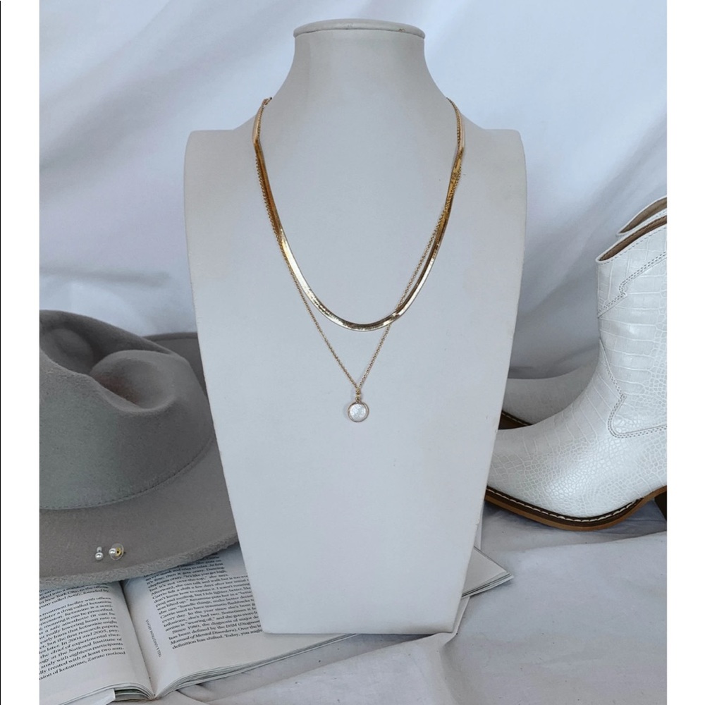Gold layering necklace and pearl earrings